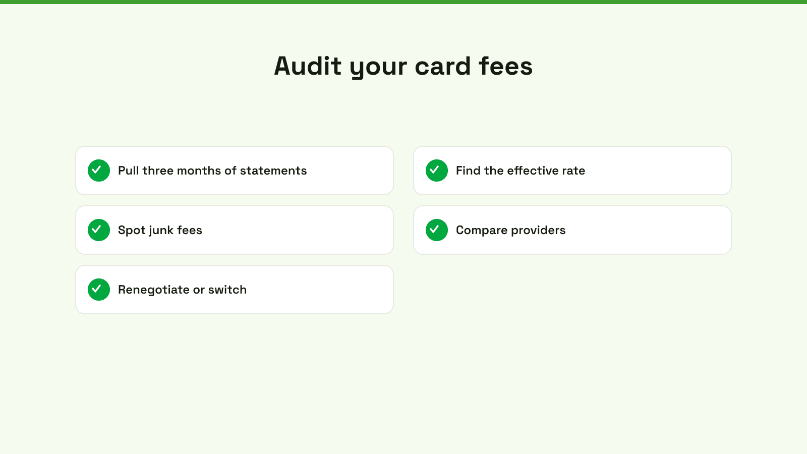 A professional analyzing credit card processing fee data on a laptop screen in a modern home office.